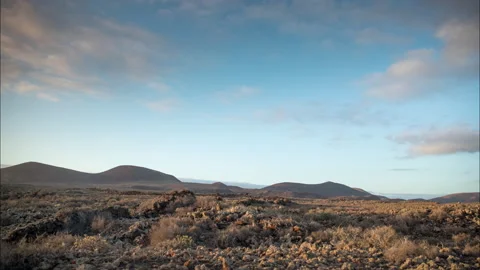Loopable video of clouds above desert in Fuerteventura Stock Footage 132924578