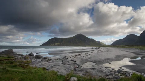 Loopable video of clouds and mountains on Lofoten beach, Norway Stock Footage 132925262