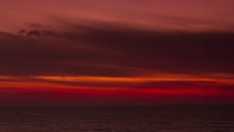 Loopable video of clouds moving in sky at sunset over Mediterranean sea 스톡 동영상 132428743