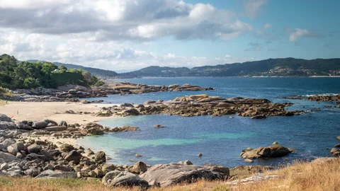 Loopable video of clouds moving in sky over galicia coastline Stock Footage 141044304