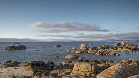 Loopable video of clouds moving in sky at sunset over Mediterranean sea Stock Footage 141044394