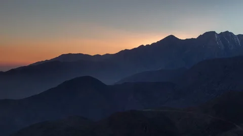 Loopable video of sun rising and setting in the Atlas Mountains Video stock 132276359