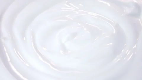 Loopable video of swirling yogurt in 4K Stock Footage 74847812
