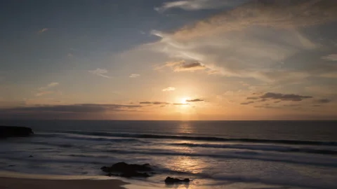 Loopable video of tide and clouds at sunset filmed in the Mediterranean Stock Footage 132403333