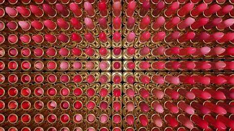 Looped 3D animation  of lipstick pattern with different color shades.  Stock Footage 261403499