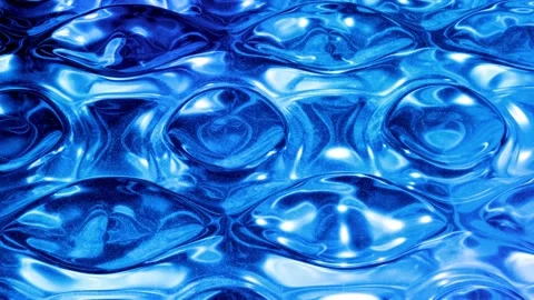Looped abstract liquid background with wavy sparkling pattern on shiny glossy Stock Footage 140990052