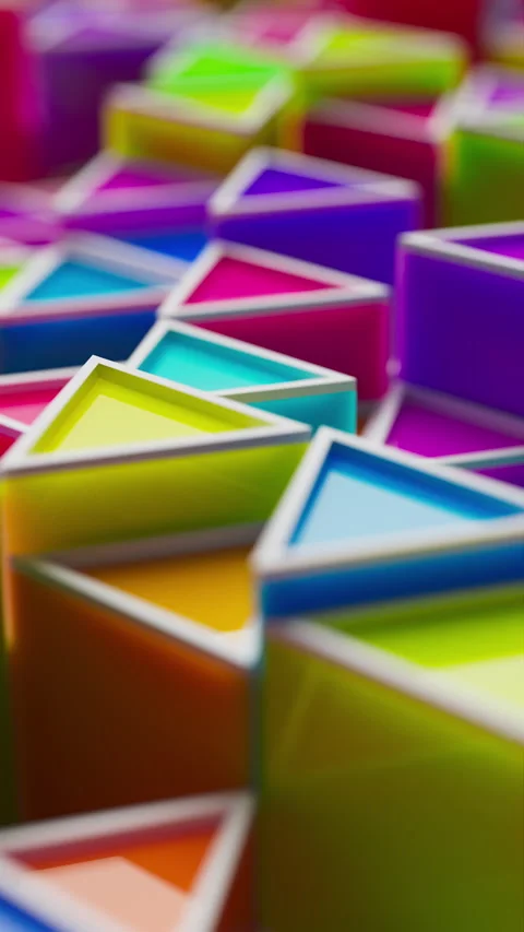 Looped animation of colorful plastic triangles in soft focus. Stock Footage 315972777