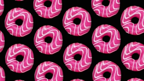 Looped animation of different donuts appearing on a purple background Stock Footage 239643594