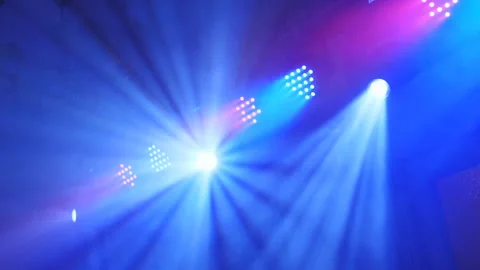 A looped animation of disco lights shining on a stage Stock Footage