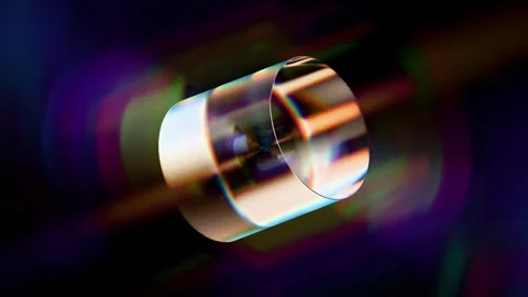Looped dynamic animation of a cylinder shape made of liquid glass material.  Stock Footage 327614136