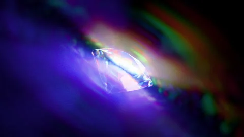 Looped dynamic animation  of a diamond shape made of liquid glass material.  Stock Footage 327613318