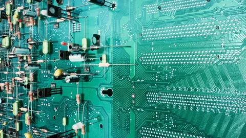 Looped technological background of the circuit board. Inside the electronic Stock Footage 140852530
