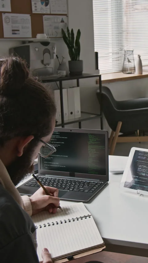 Looped Timelapse of Programmer Writing and Testing Code at IT Startup Stock Footage 286073138