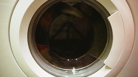 Looped video, Washing machine washes clothes Stock Footage 45763777