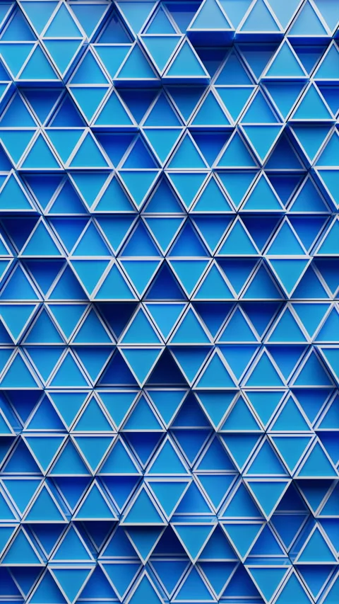 Looping 3D animation of blue triangles forming a modern, abstract background. 스톡 동영상 317502661