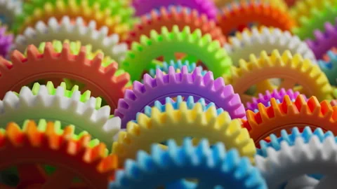 Looping 3D animation multi-colored plastic toy gears. Stock Footage 272767734