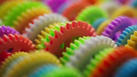 Looping 3D animation multi-colored plastic toy gears. Stock Footage 272768455
