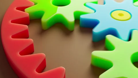 Looping 3D animation multi-colored plastic toy gears. Stock Footage 274445404