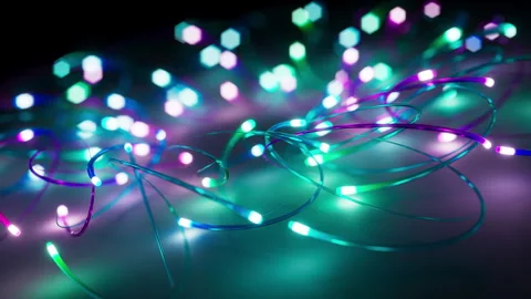 Looping 3D animation of neon multicolor glowing lines moving in space Stock Footage 274441733