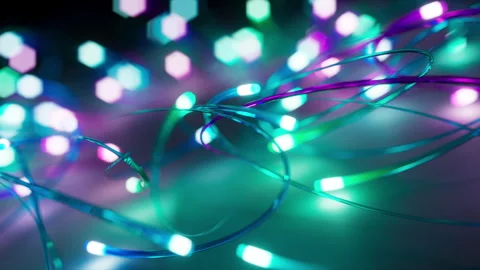 Looping 3D animation of neon multicolor glowing lines moving in space Stock Footage 274441845