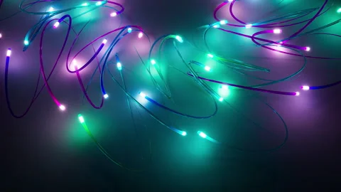 Looping 3D animation of neon multicolor glowing lines moving in space Stock Footage 274441988