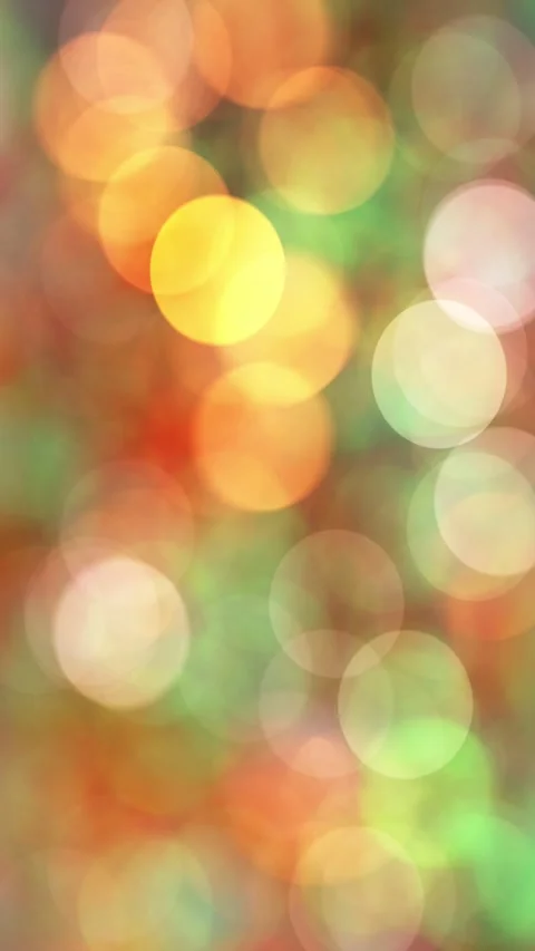 Looping 3D animation of the shining green, orange and yellow light bokeh Stock Footage 274657591