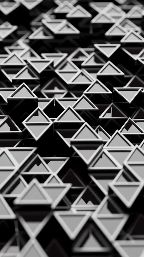 Looping animation of 3D triangular patterns with depth of field blur. Video stock 315972978