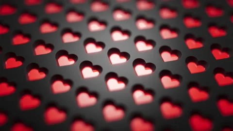 Looping animation of appearance against a black background of bright red hearts. Stock Footage 274445755