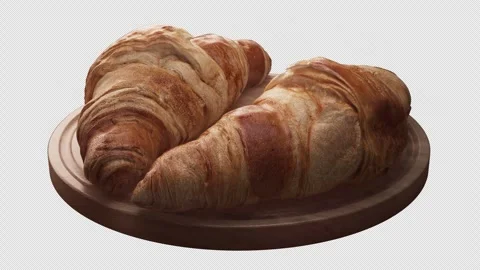 Looping animation around a composition of two croissants lying on a wooden board 스톡 동영상 308738947