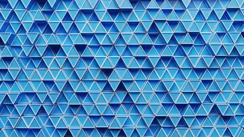 Looping animation of a group of blue plastic triangular geometric shapes. Stock Footage 276442088