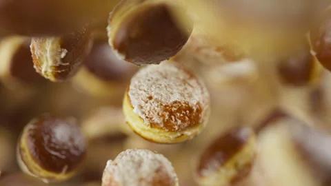 Looping animation of a group of donuts. Defocus. Close-up. Stock Footage 308739101