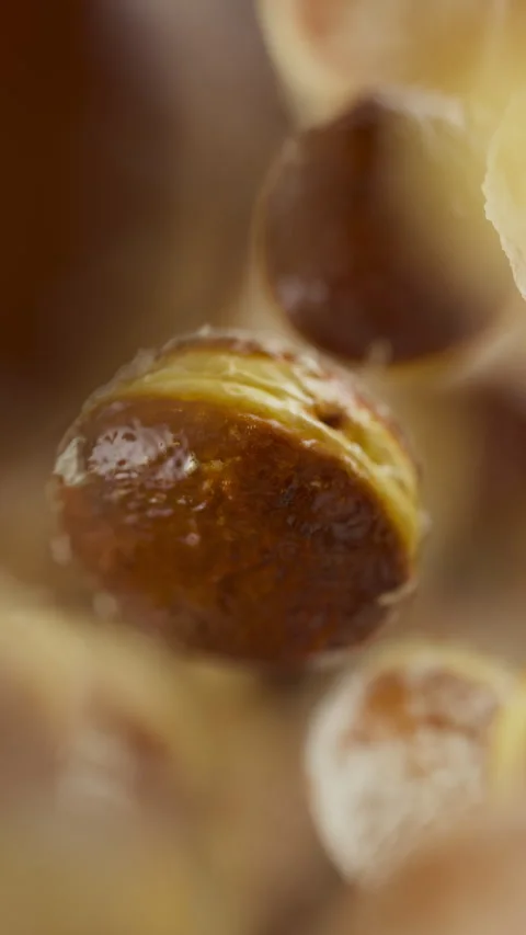 Looping animation of a group of donuts. Defocus. Close-up. Stock Footage 315523227