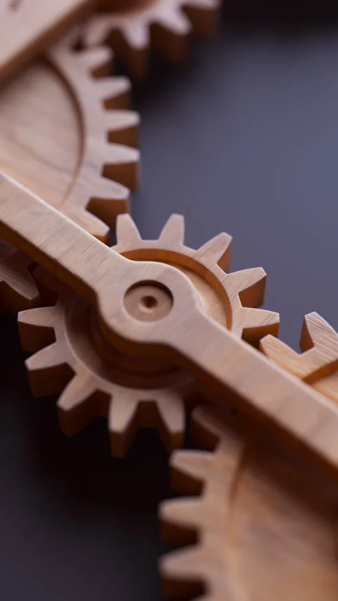 Looping animation of a mechanical construction made of wooden gears. Stock Footage 308075938