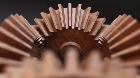Looping animation of a mechanical construction made of wooden gears. Stock Footage 308740057