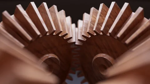 Looping animation of a mechanical construction made of wooden gears. Video stock 312110645