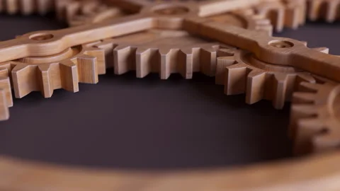 Looping animation of a mechanical construction made of wooden gears. Stock Footage 315524218