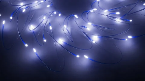 Looping animation of neon glowing lines moving in space Stock Footage 273996408
