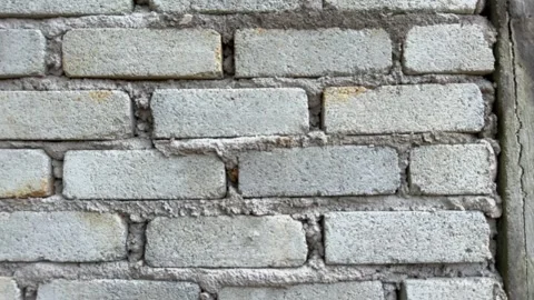 Looping Brick Cement Wall Texture Video Close Up Stock Footage 328985190