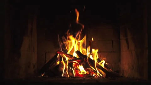 A Looping Clip of a Fireplace with Medium Size Flames Burning Fire Slow Motion Stock Footage 146440612