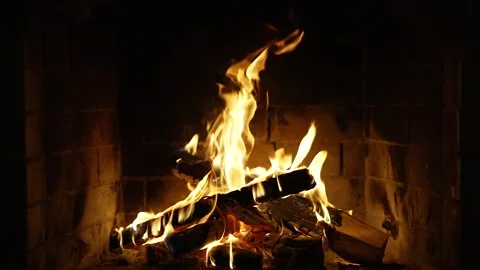 A Looping Clip of a Fireplace with Medium Size Flames Burning Fire Slow Motion Stock Footage 220823127