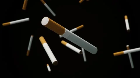 Looping close up of a cigarette against a black Background 库存影片 58800176