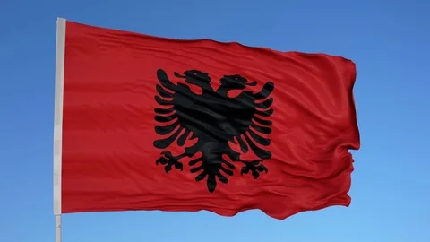 Looping flag for Albania on flag pole, blowing beautifully in the wind. Includes Stock Footage 79764147