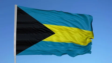 Looping flag for Bahamas on flag pole, blowing beautifully in the wind. Includes Stock Footage 79773829