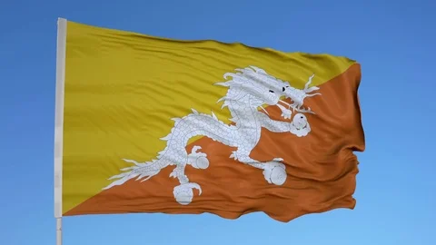 Looping flag for Bhutan on flag pole, blowing beautifully in the wind. Includes Stock Footage 79775621