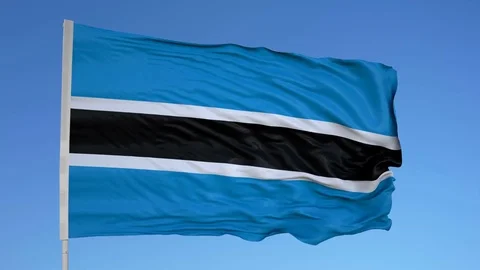 Looping flag for Botswana on flag pole, blowing beautifully in the wind. Stock Footage 79773936