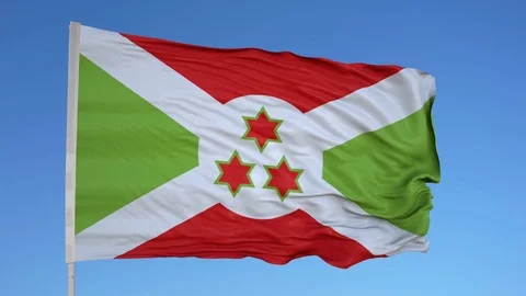 Looping flag for Burundi on flag pole, blowing beautifully in the wind. Includes Vídeo Stock 79774202