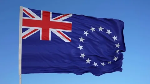 Looping flag for Cook Islands on flag pole, blowing beautifully in the wind. Stock Footage 79774272