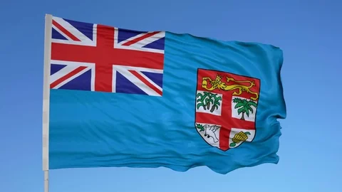 Looping flag for Fiji on flag pole, blowing beautifully in the wind. Includes Stock Footage 79763482
