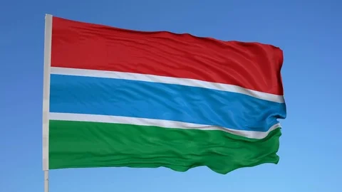 Looping flag for Gambia on flag pole, blowing beautifully in the wind. Includes Stock Footage 79771654