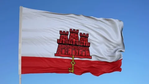 Looping flag for Gibraltar on flag pole, blowing beautifully in the wind. Stock Footage 79775913